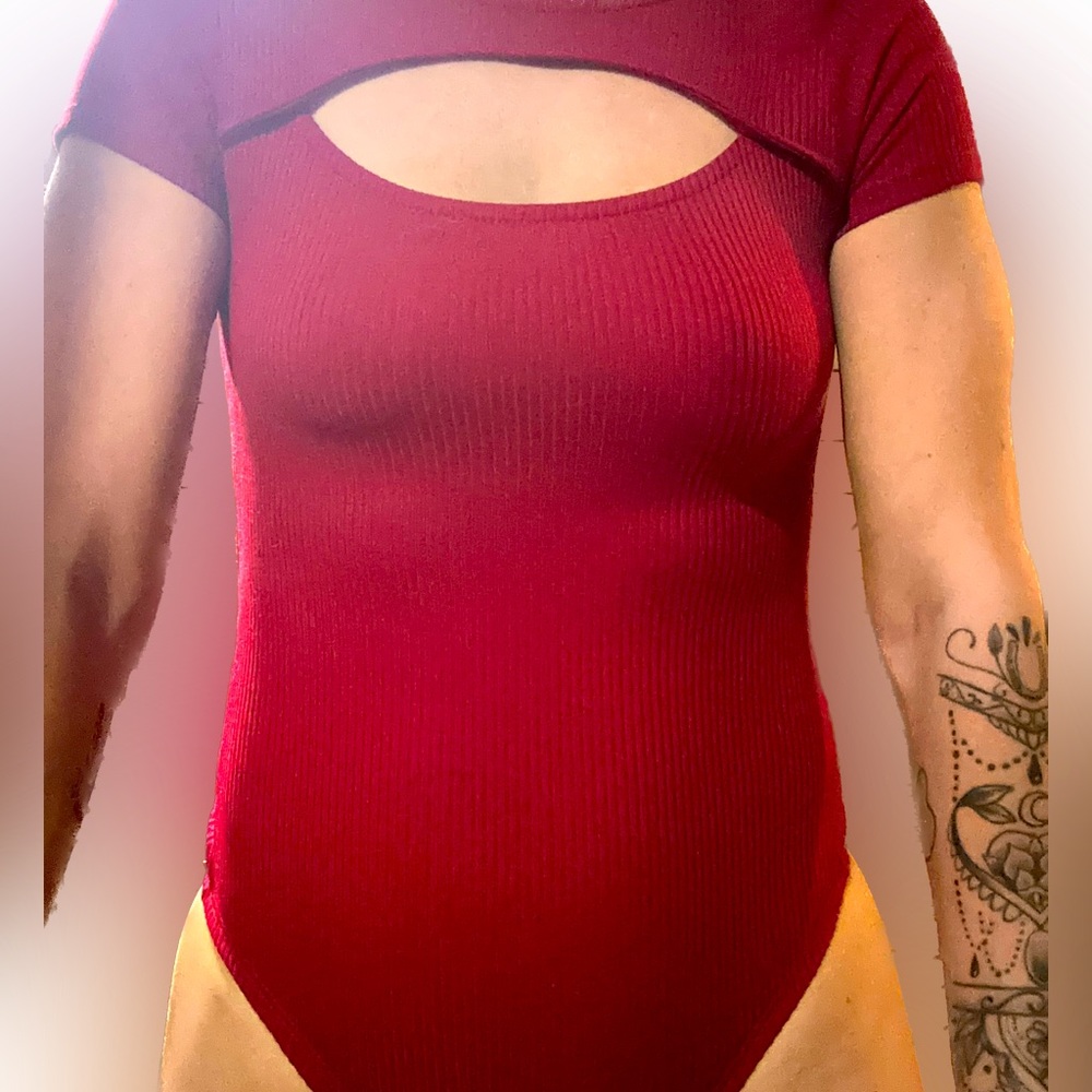 Thong short sleeve body suit with cut-out above chest